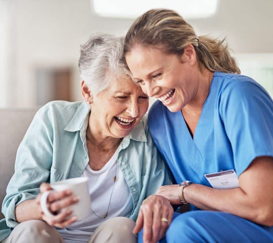 Healthcare worker assisting senior